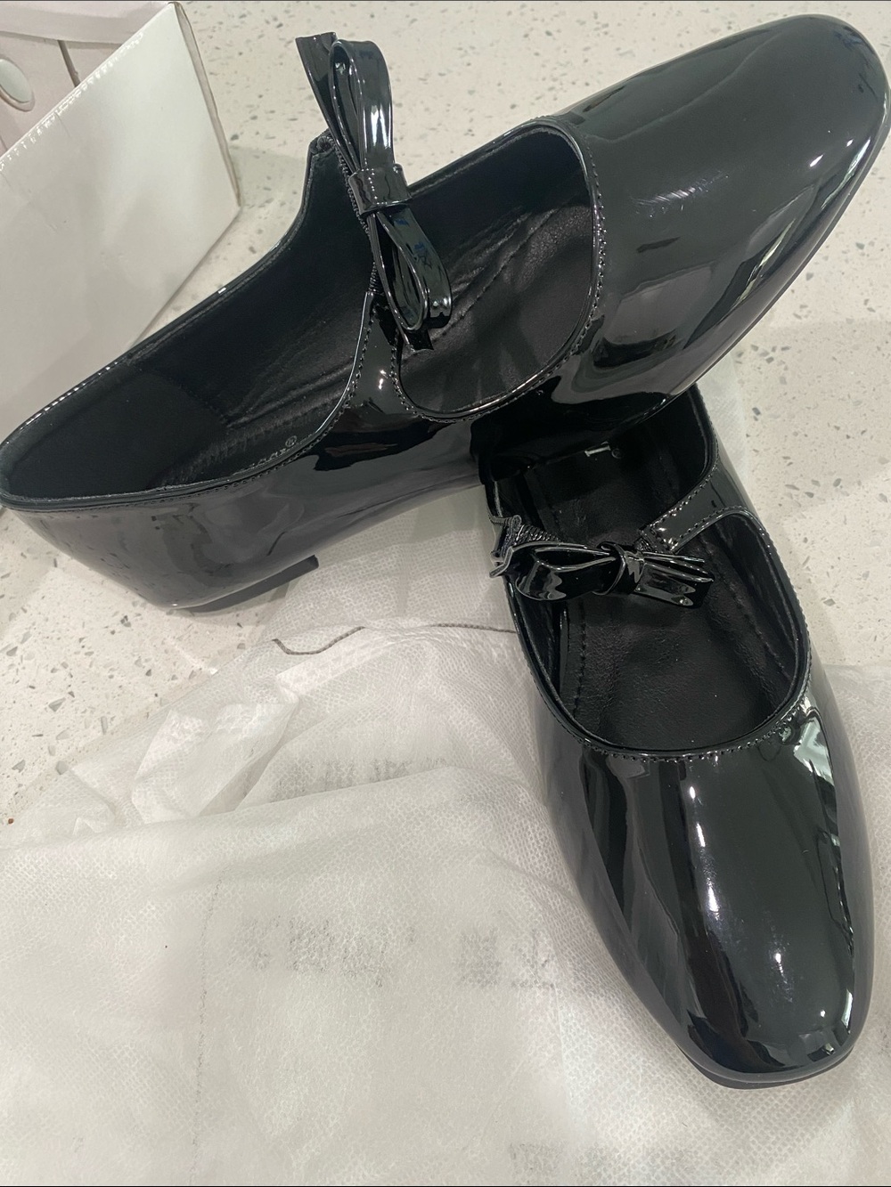 Patent Black Women’s Mary Jane Flats with Bow Accent